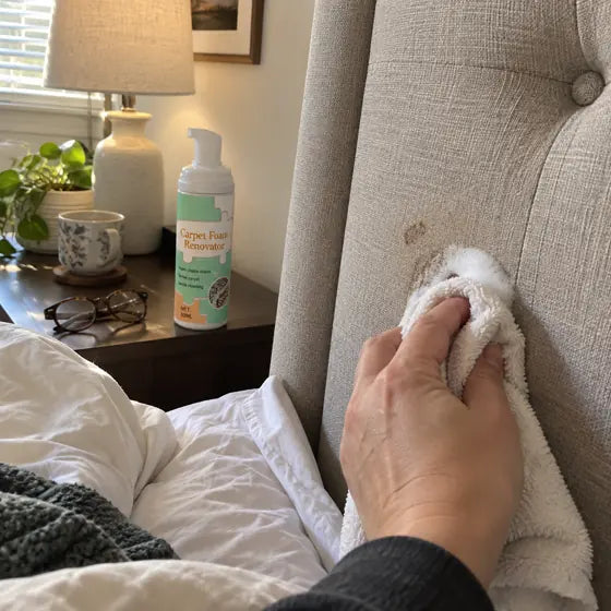 Fabric headboard spot cleaned with foam stain remover