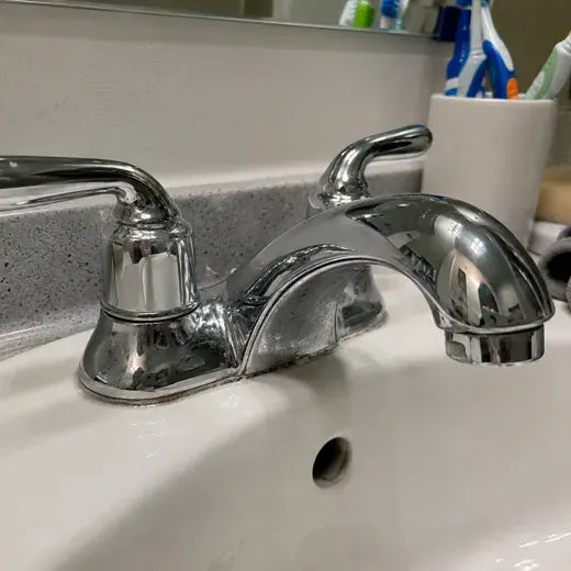 Bathroom faucet with older water-spot buildup