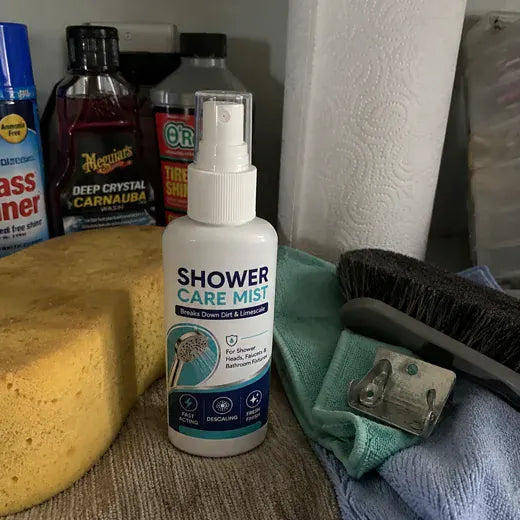 Shower Care Mist stored with weekly cleaning supplies