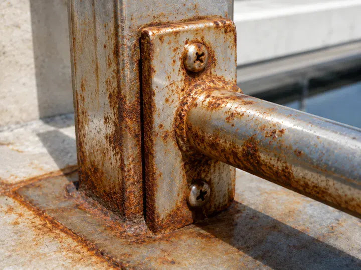 Before cleaning rust and buildup on a metal fixture